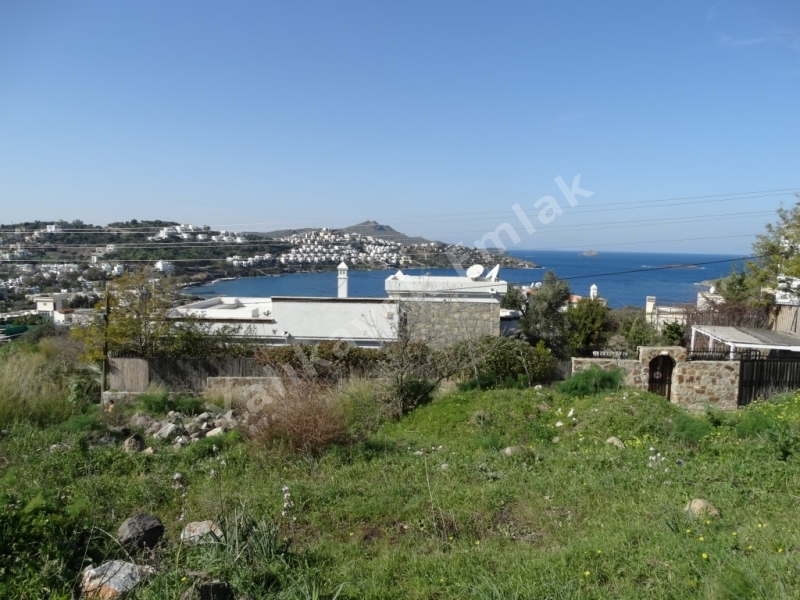 YALIKAVAK TİLKİCİK KOYUNDA SATILIK İMARLI ARSA.