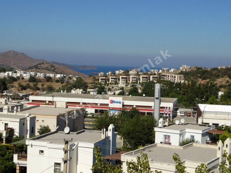 YALIKAVAK EMLAK TAN 2+1 KİRALIK ÜSTKAT DAİRE.